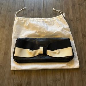 Kate spade black clutch with black and white bow